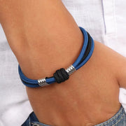 Bracciale in Acciaio di tessuto blu e nero con due elementi in metallo lucido lavorato