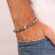 Bracciale in Acciaio con pietre naturali e ruota carretto siciliano in acciaio