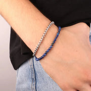 Bracciale in Acciaio doppio filo con tramatura in acciaio e sfere in sfumature di blu