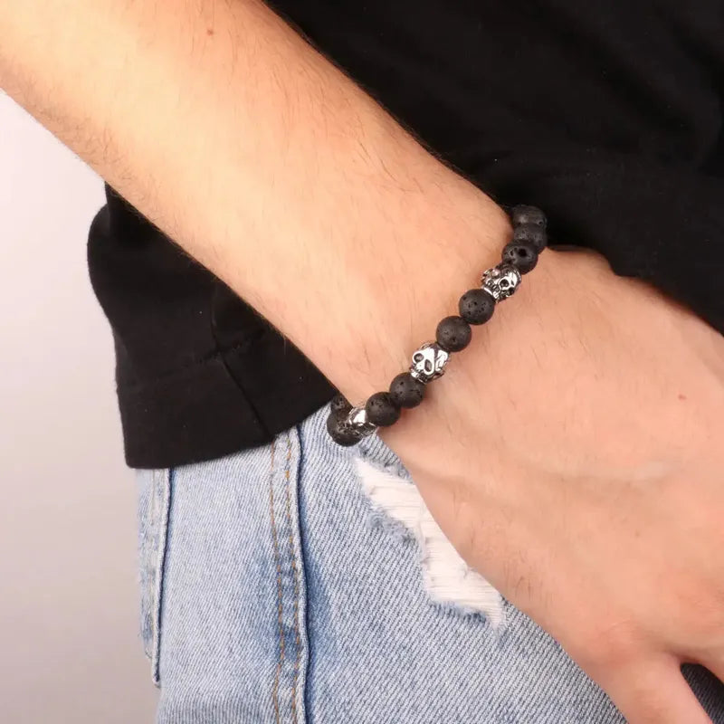 Bracciale in Acciaio con sfere color lava alternate da teschi