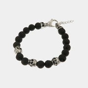 Bracciale in Acciaio con sfere color lava alternate da teschi
