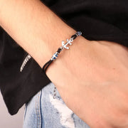 Bracciale in Acciaio in cordino nero con dettaglio centrale a forma di ancora