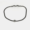 Bracciale in Acciaio con cristalli neri e piccolo timone centrale