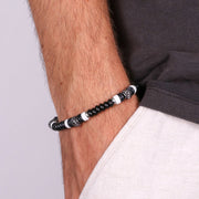 Bracciale in Acciaio con laccetto e perline