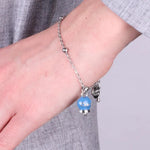 Bracciale in Acciaio con campanella pendente blu cobalto   con scritta Capri - BYSIMON gioielli