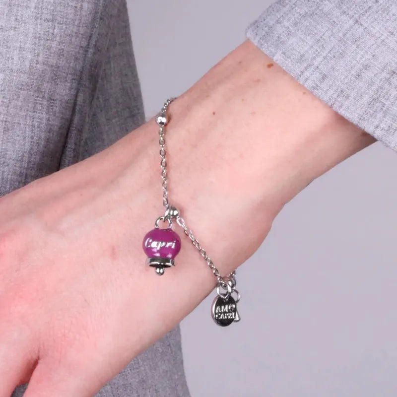 Bracciale in Acciaio con campanella pendente borgogna   con scritta Capri - BYSIMON gioielli