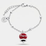 Bracciale in Acciaio con campanella pendente borgogna   con scritta Capri - BYSIMON gioielli