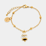 Bracciale in Acciaio con campanella pendente bianca e oro con scritta Capri | gioielli in acciaio | BYSIMON