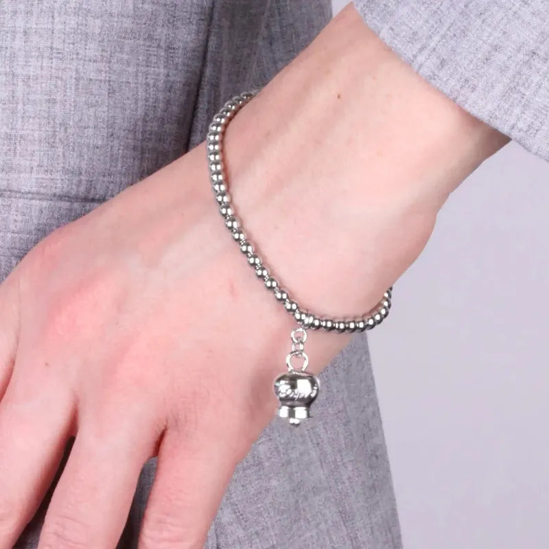 Bracciale in Acciaio a perline con campanella  pendente  con scritta Capri - BYSIMON gioielli