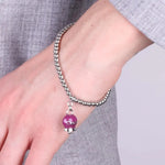 Bracciale in Acciaio   con campanella pendente borgogna   con scritta Capri - BYSIMON gioielli