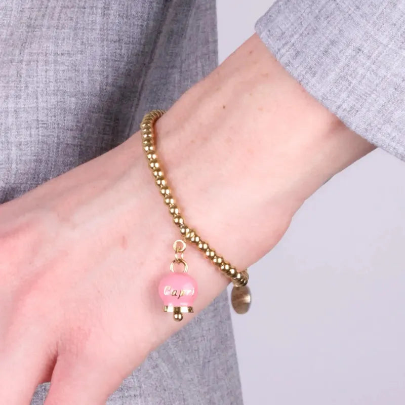 Bracciale in Acciaio  con campanella  pendente rosa  con scritta Capri - BYSIMON gioielli