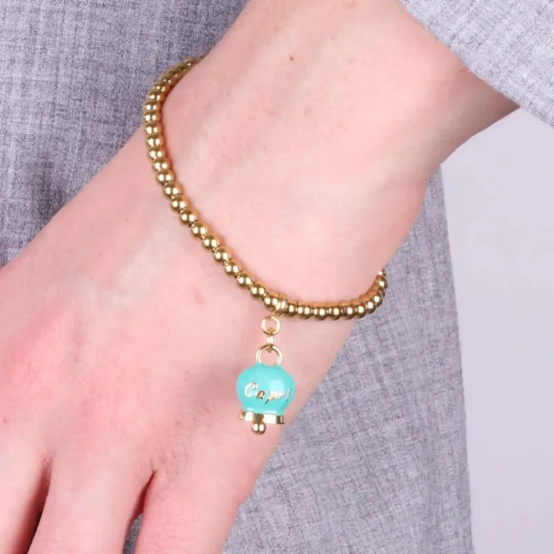 Bracciale in Acciaio  con campanella  pendente verde  con scritta Capri - BYSIMON gioielli