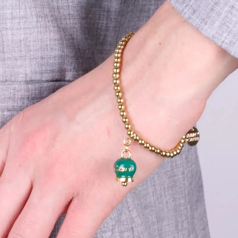 Bracciale in Acciaio  con campanella pendente verde   con scritta Capri - BYSIMON gioielli