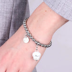 Bracciale in Acciaio con campanella  bianca con scritta Capri - BYSIMON gioielli