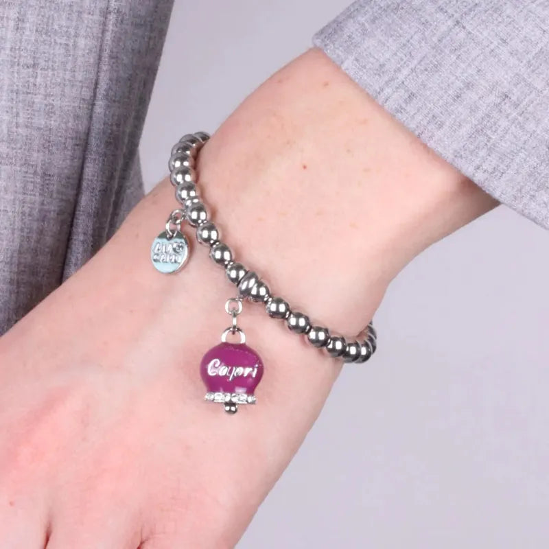 Bracciale in Acciaio a perline con campanella borgogna   con scritta Capri - BYSIMON gioielli