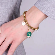 Bracciale in Acciaio  con campanella verde   con scritta Capri