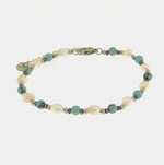 Bracciale in Acciaio con giro di perle e sfere turchesi - BYSIMON gioielli