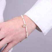 Bracciale in Acciaio con giro di perle e cristallo rosa