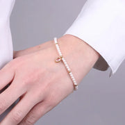 Bracciale in Acciaio con giro di perle e cristallo ovale rosa