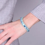 Bracciale in Acciaio con cristalli acqua con base verde