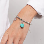 Bracciale in Acciaio campanella verde acqua con scritta Capri e zirconi - BYSIMON gioielli