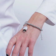 Bracciale in Acciaio campanella Capri bianca con pois blu