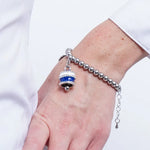 Bracciale in Acciaio campanella Capri con strisce blu - gioiello BySimon