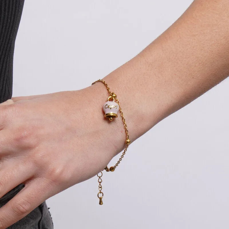 Bracciale in Acciaio con Campanella Portafortuna Capri - Colore Rosa Cipria - gioiello BySimon