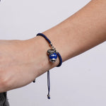 Bracciale in Acciaio Cordino Blu e Campanella Portafortuna blu Mare di Capri - gioiello BySimon