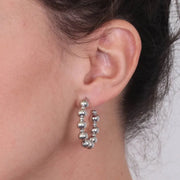 Orecchini in Metallo  a cerchio con sfere