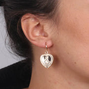 Orecchini in Metallo con cuore pendente e simboli religiosi