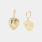 Orecchini in Metallo con cuore pendente e simboli religiosi