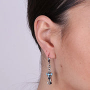 Orecchini in Metallo cerchietto con cornetto pendente impreziosito da punti di smalto turchese
