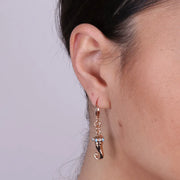 Orecchini in Metallo cerchietto con cornetto pendente impreziosito da punti di smalto turchese