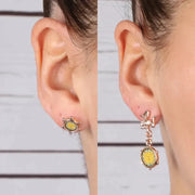 Orecchini in Metallo con trinacria siciliana e tamburello pendente impreziosito da disegno sole e bottone a lobo