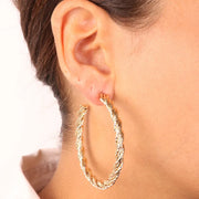 Orecchini in Metallo a cerchio con lavorazione a torciglione