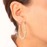 Orecchini in Metallo a cerchio con lavorazione effetto diamantato