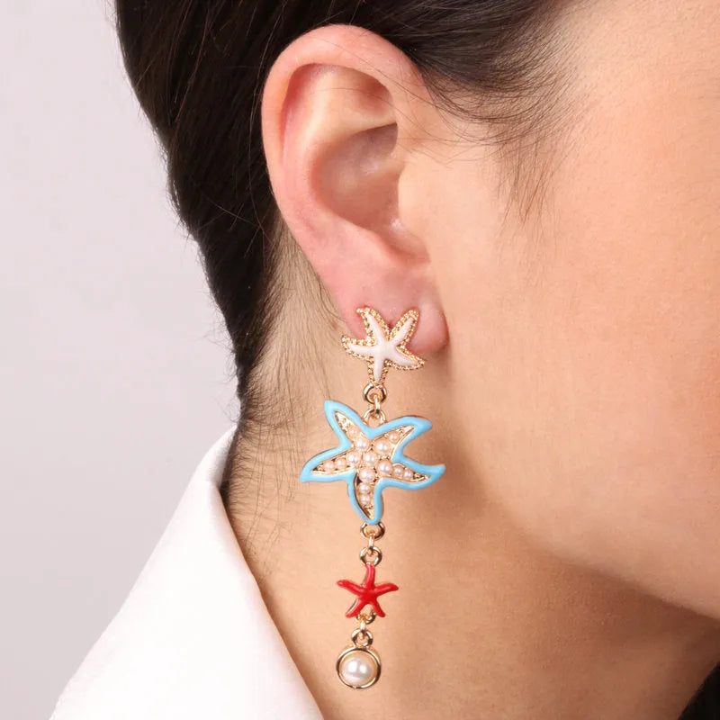 Metal earrings with starfish