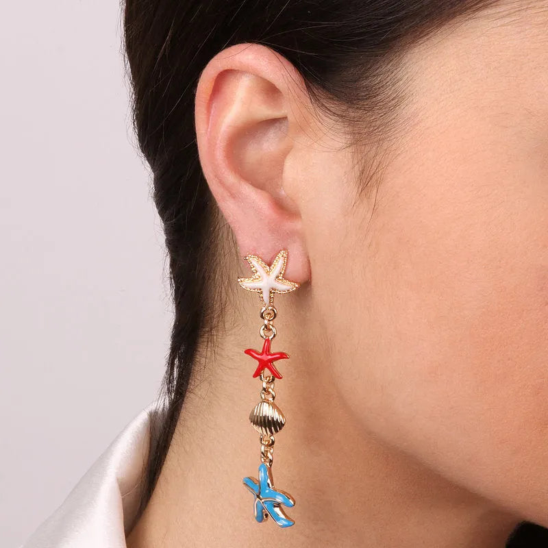 Metal earrings with starfish