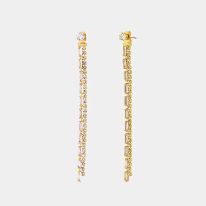 Metal earrings with hanging white crystals