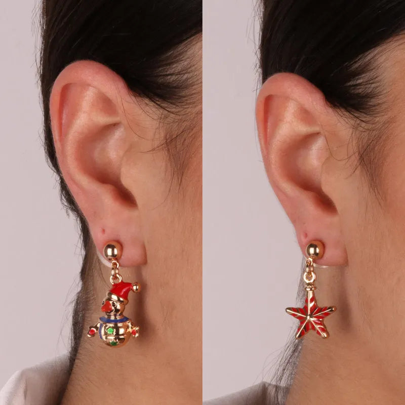 Metal earrings with snowman and star