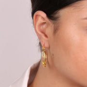 Orecchini in Metallo a semicerchio con catene intrecciate