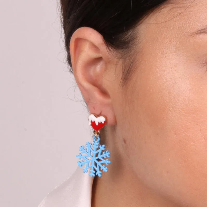 Metal earrings with snowflake