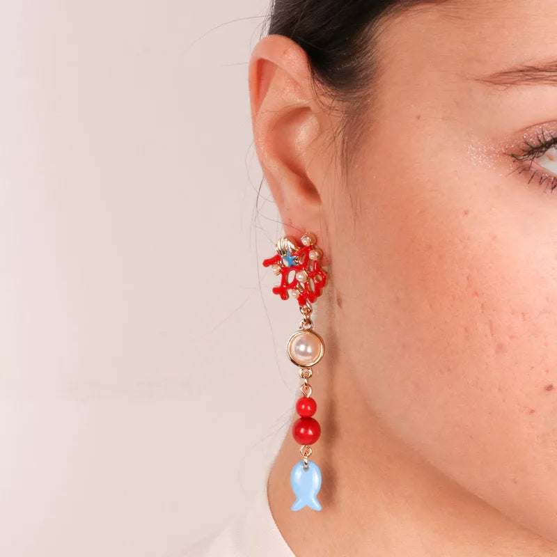 Metal earrings with coral lobes and colored pendants