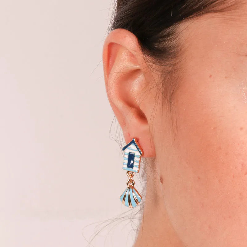 Small metal earrings with pendant shell