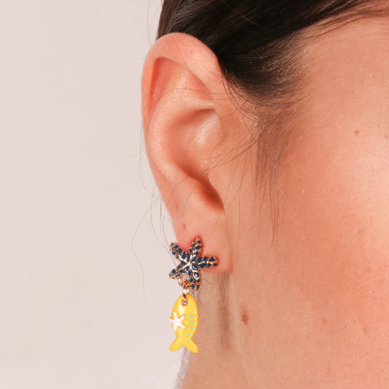 Metal earrings with pendant yellow fish and lobe starfish
