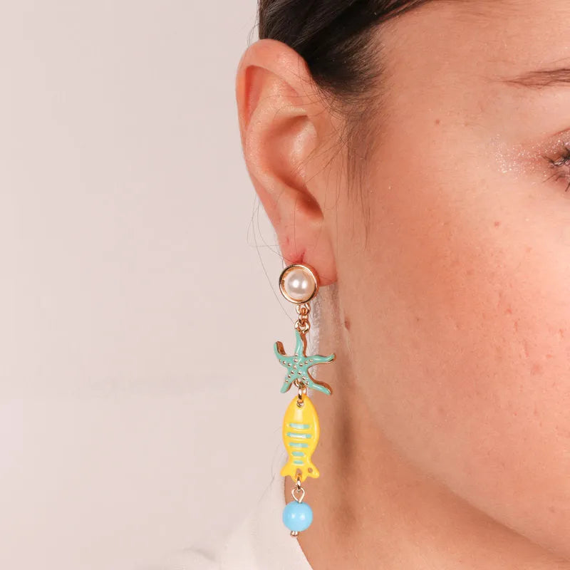 Metal earrings with pearl lobe and hanging starfish and fish