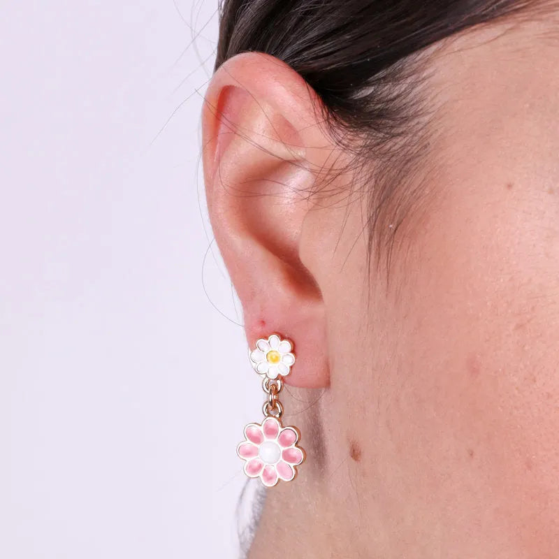 Metal earrings with pink and white daisies