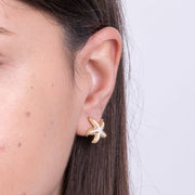 Orecchini in Metallo con stella marina bianca