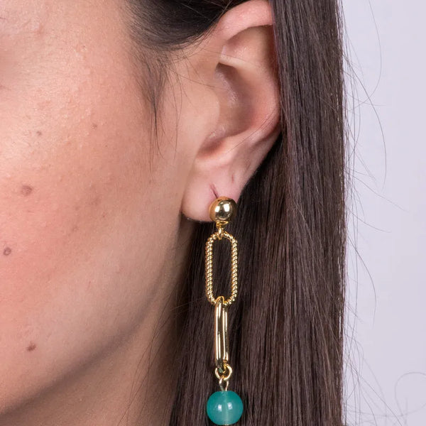 Metal earrings with blue crystal